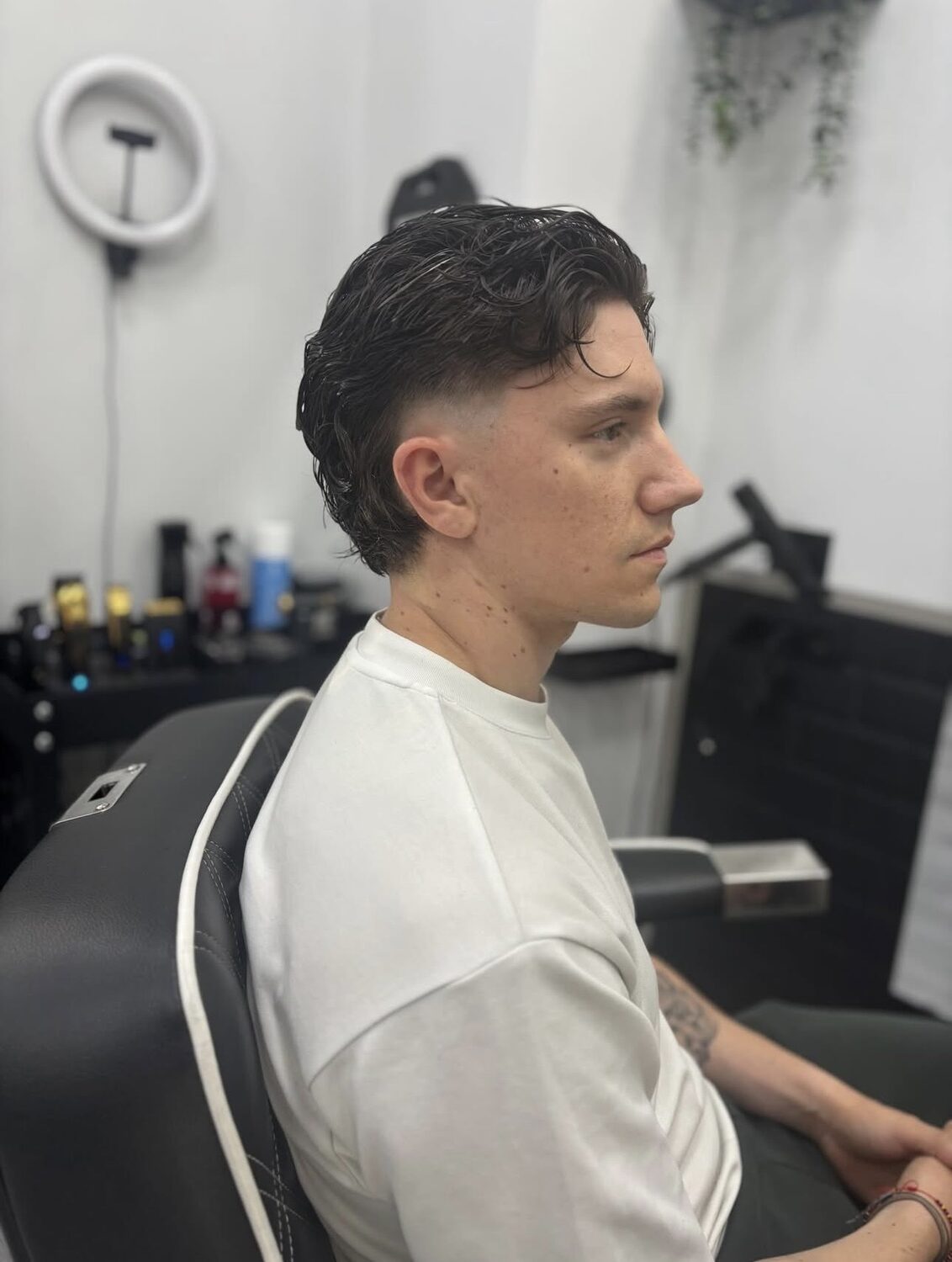 Mullet rizado con fade